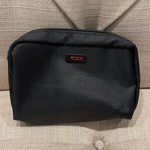 TUMI Mini toiletries bag. 4x6x1.5